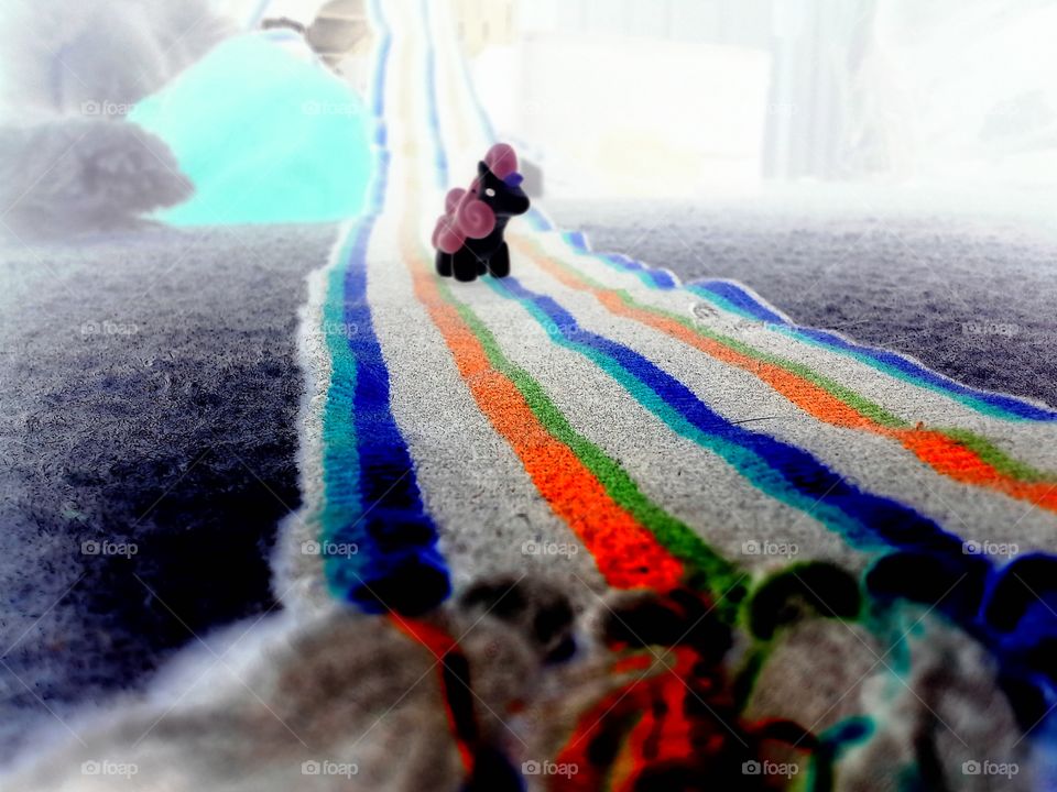 A unicorn walking along an interesting patterned grounding