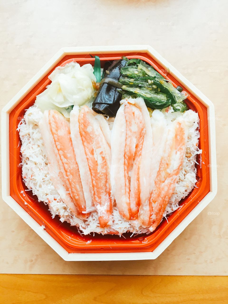 Directly above shot of crabs with rice on bowl