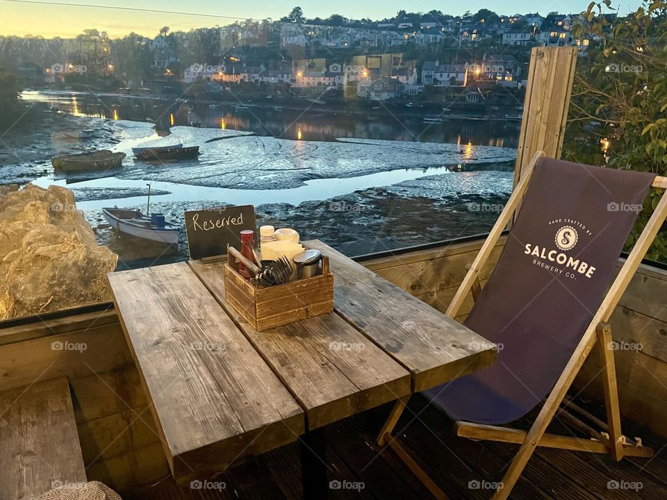 Welcoming outdoor seating area at The Swan Inn Pub, Noss Mayo, Devon 