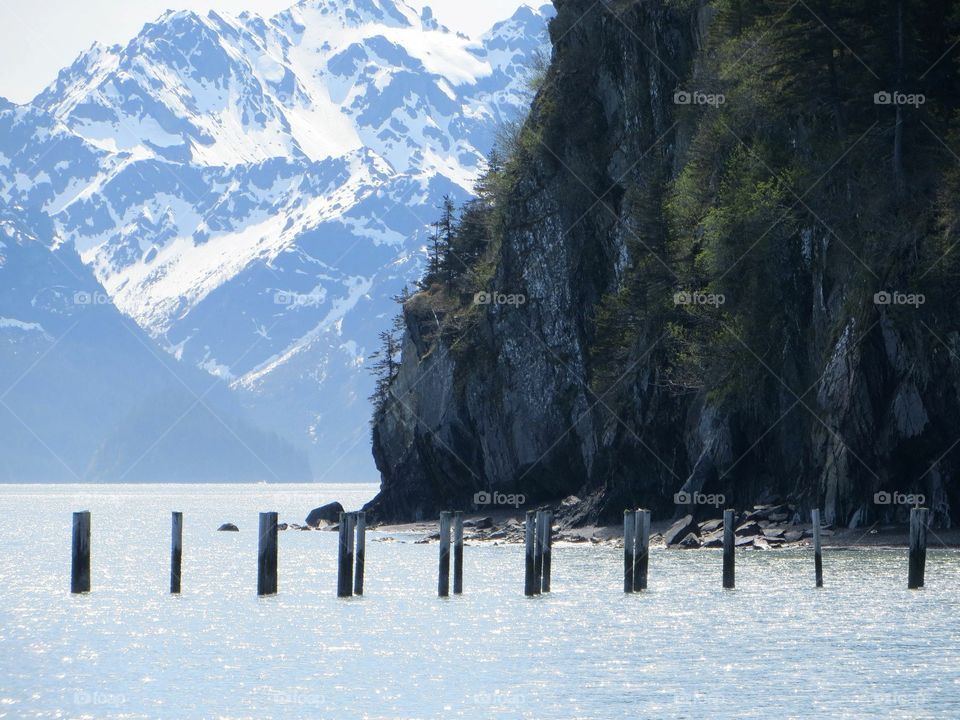 Wooden post on idyllic lake