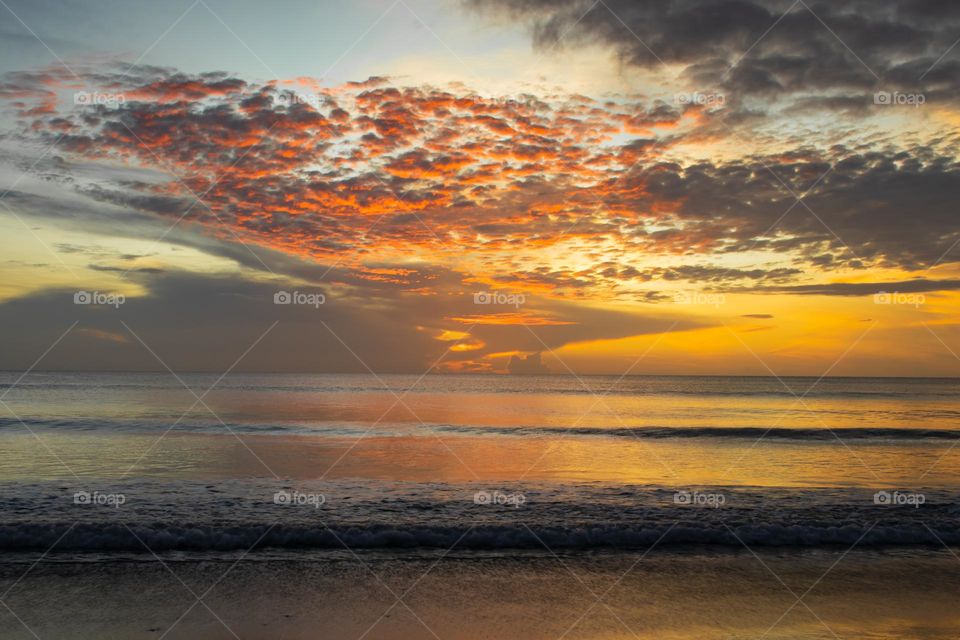 A glorious sunrise at Trincomalee, Sri Lanka. Magic of nature. Creating beautiful colours and patterns. Clouds grabbing all the attention.