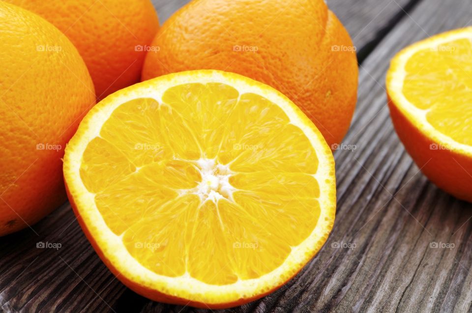 Halved orange on table