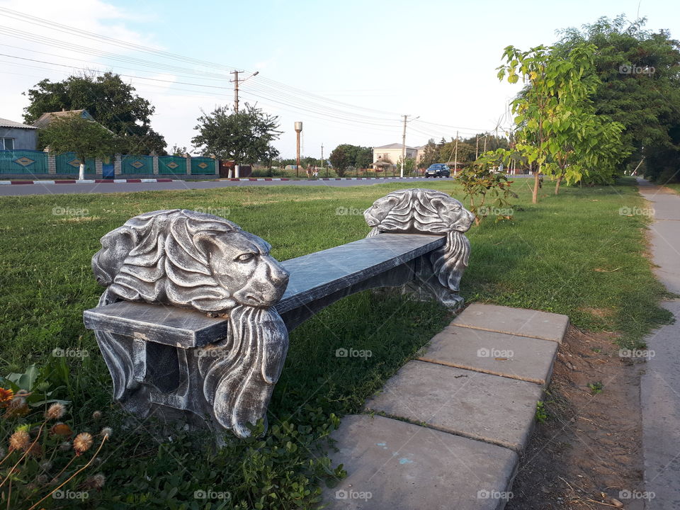 Bench with stone lions