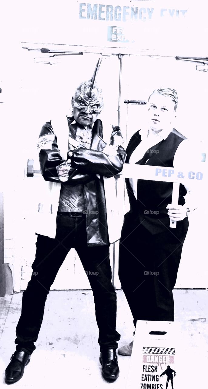 Portrait of two men's dressed up for halloween