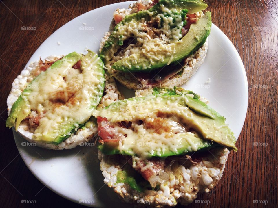 Oddly yummy sandwiches . Sandwiches with avocado, ham, cheese and special sous  