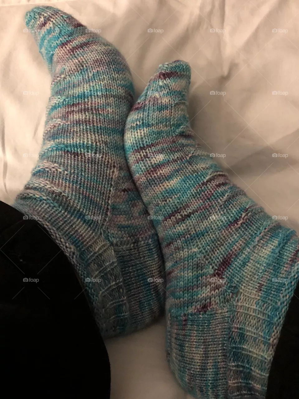 Hand knit socks in blues and purples