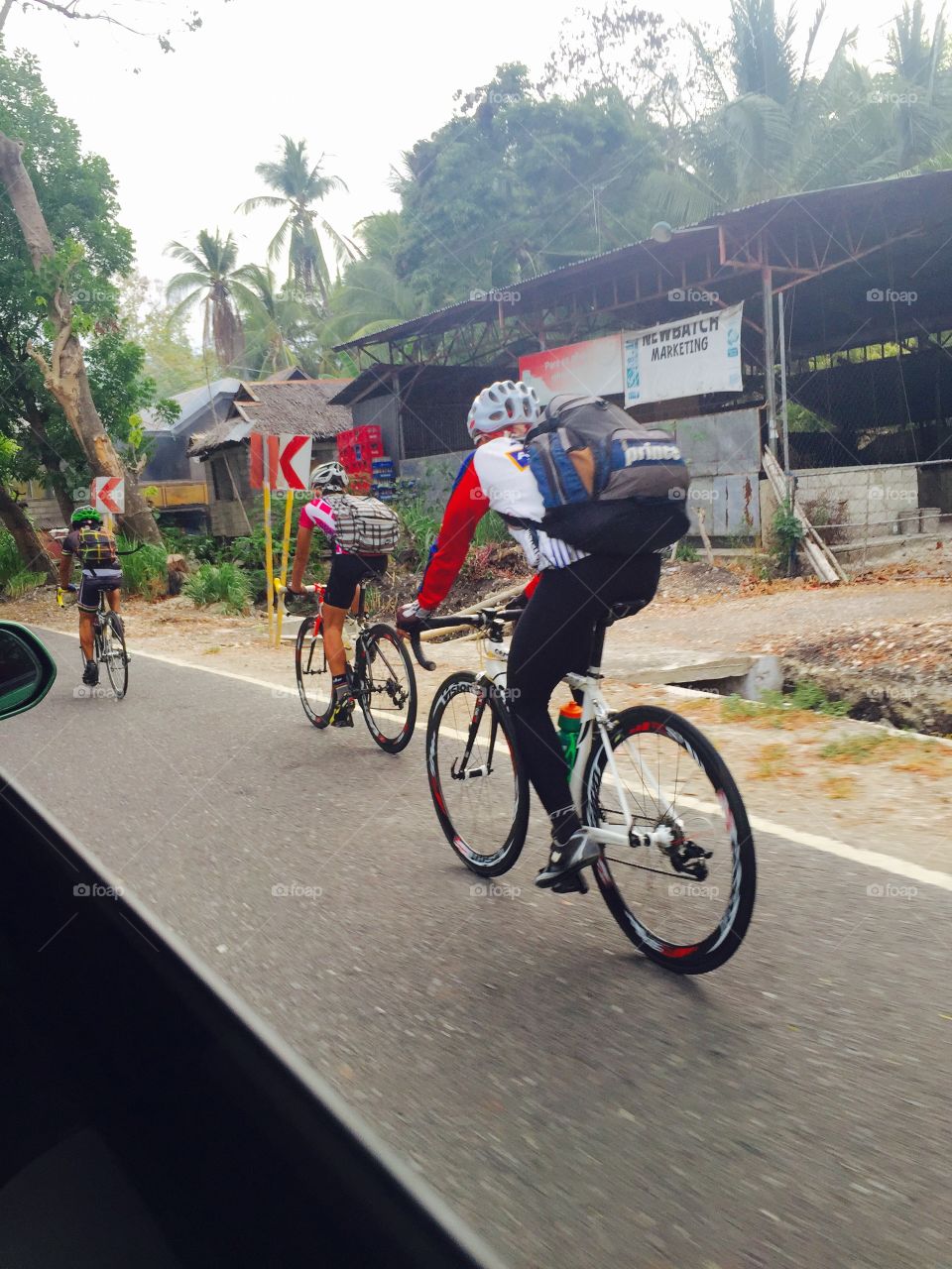 Men and their bcycles. Men riding bicycles