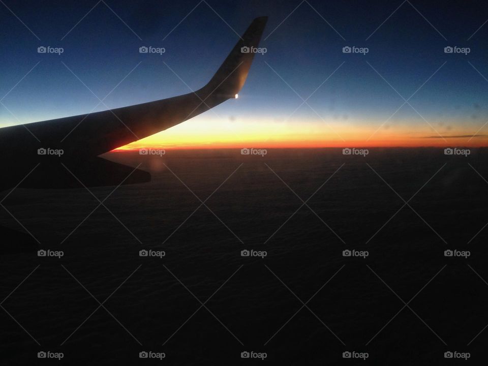 Flying over the French country in the sunset