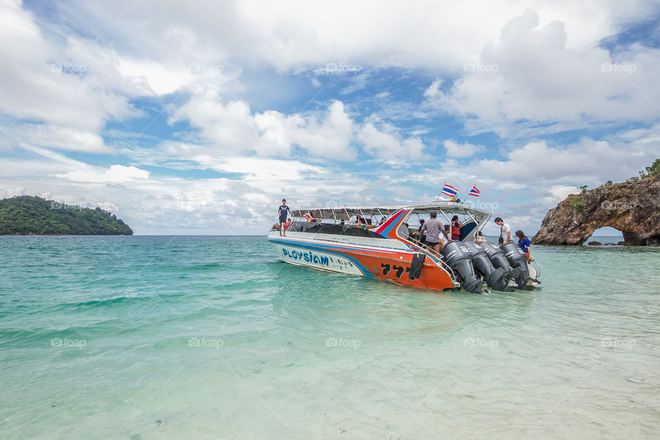 People traveling on motorboat in Koh lipe