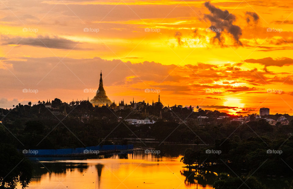View to the Shwedagon Pagoda of Yangon before Rangun in Myanmar before Burma Southeast Asien during the Sunrise Timeline