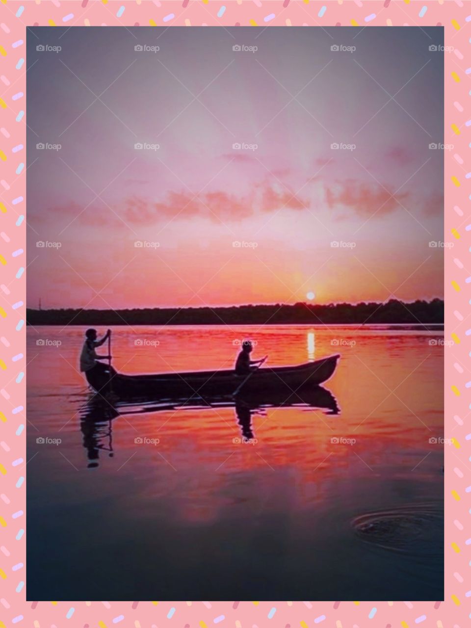 The Sunset At The ShriLangka Sea.
The Sunset lights reflects on the sea And There's one small boat passing by with two people ridding on it.
their shadows are very clear.