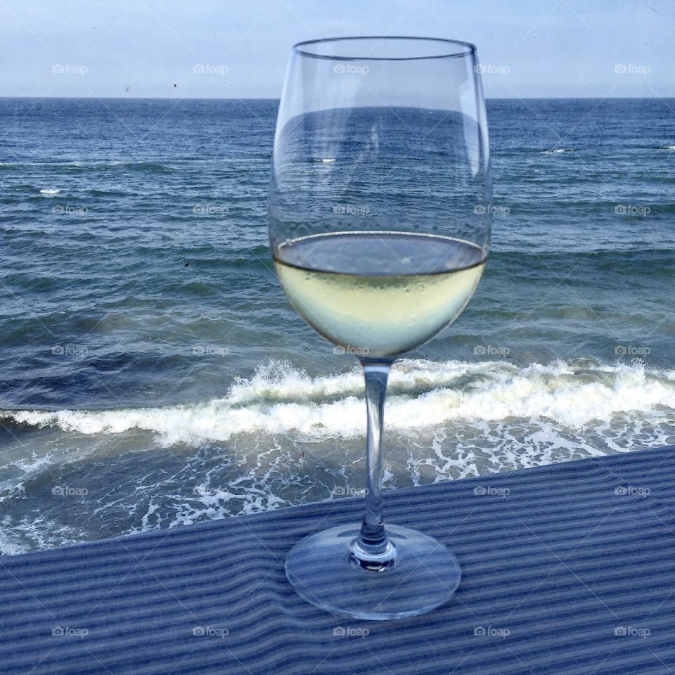 A glass of wine on the seaside 