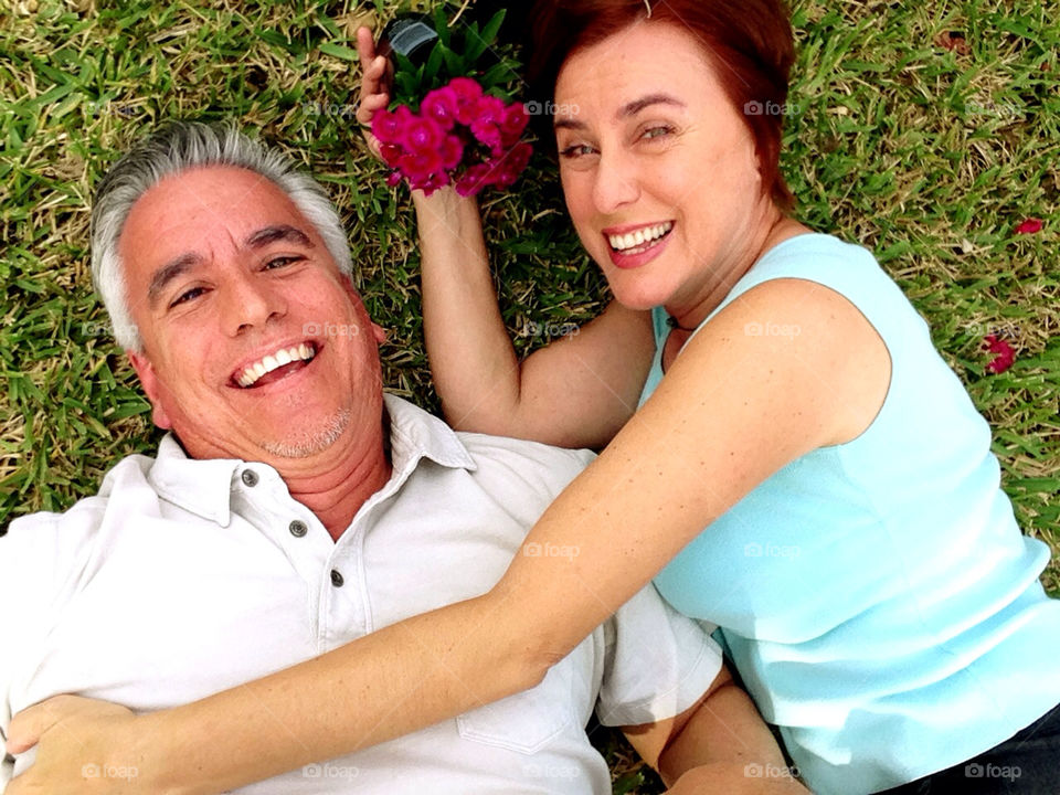 Couple with flowers in garden