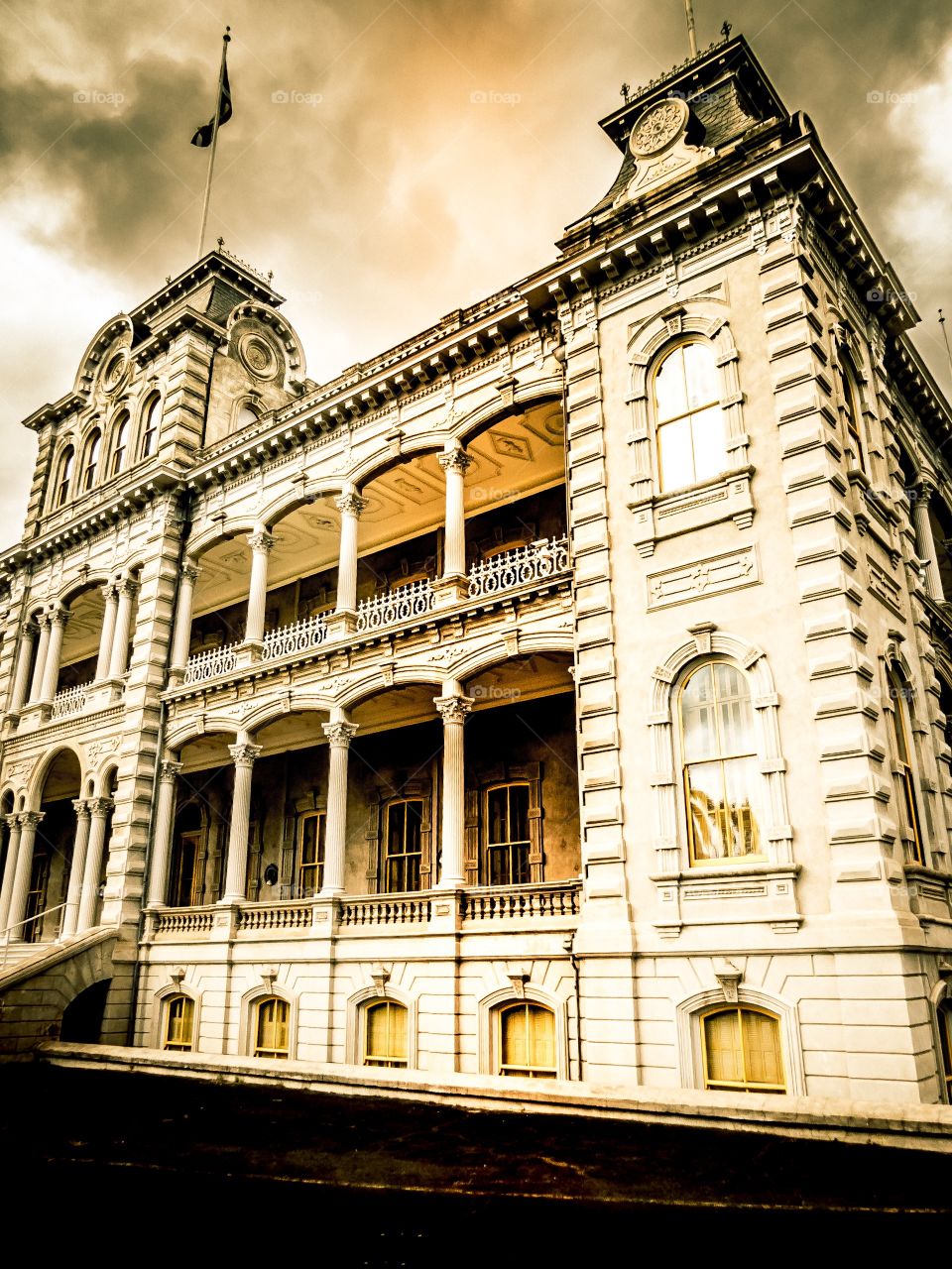 Iolani Palace lit in the early evening. Honolulu, Oahu, Hawaii. 