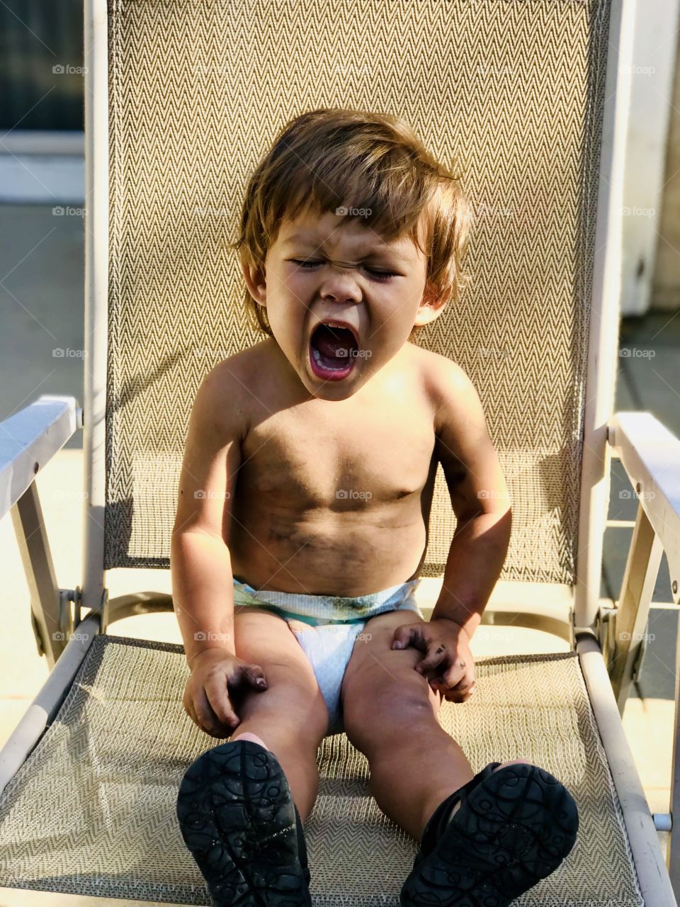 Andrew was playing in the backyard 