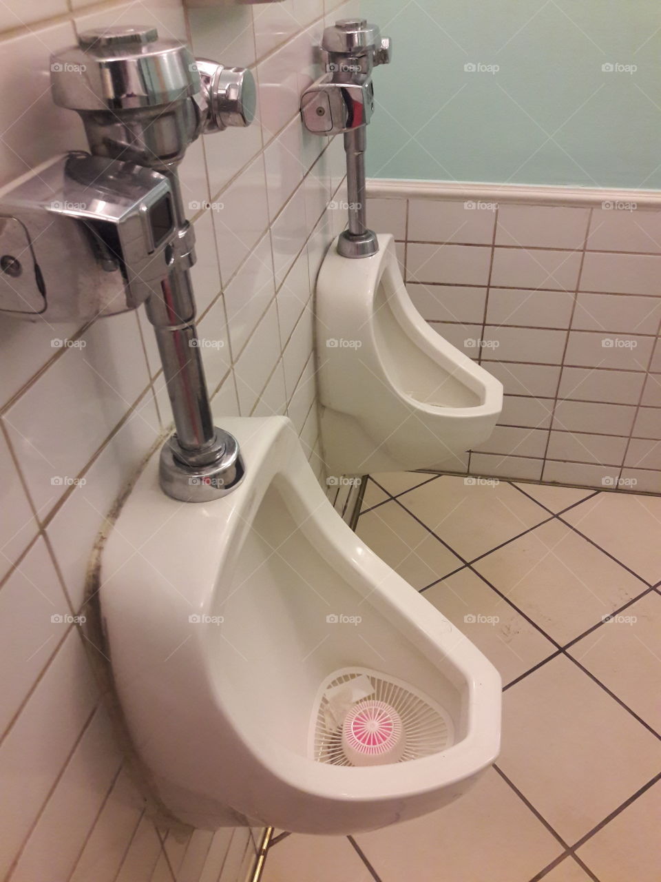 urinals  men public restroom