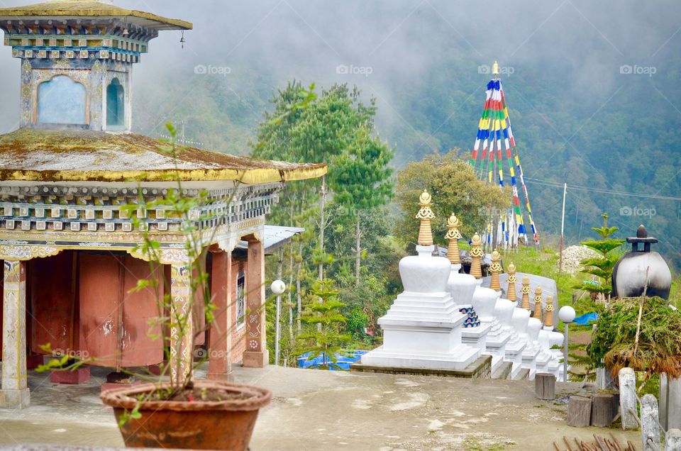 Religious stupa and prayer flags 