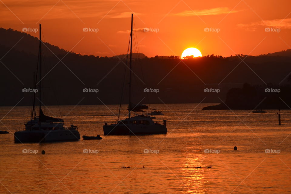 Sailboat at Spain sunset 