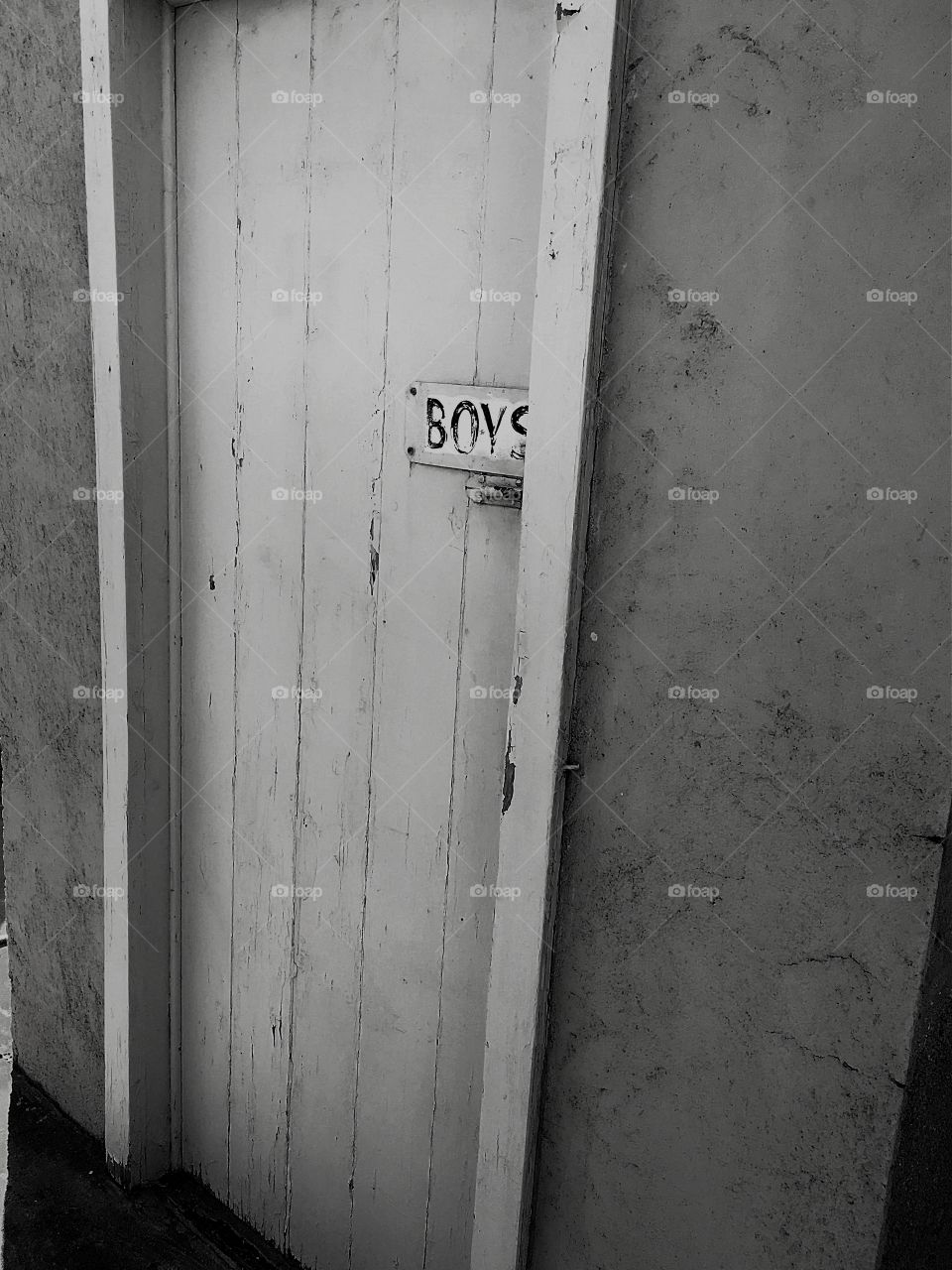 Old door to boy's outhouse . Old grungy door to boys' outhouse, toilet in south Australia 