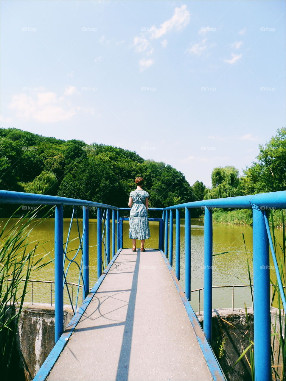 girl on the nature near the lake