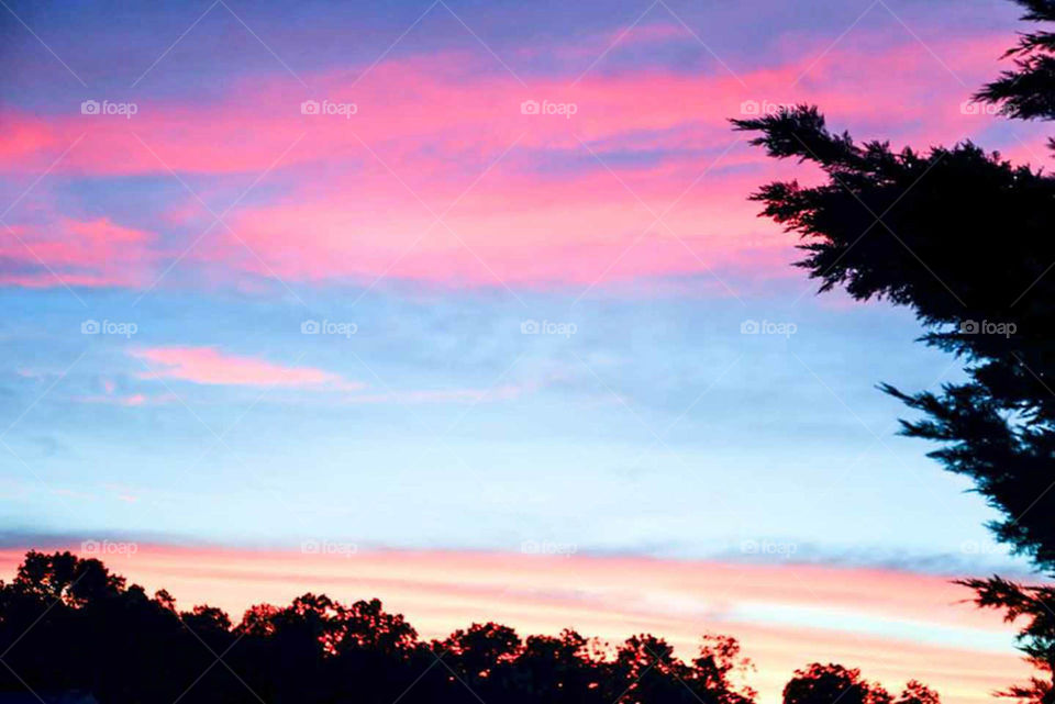 sunset after a storm. colorful sky during sunset from my front porch