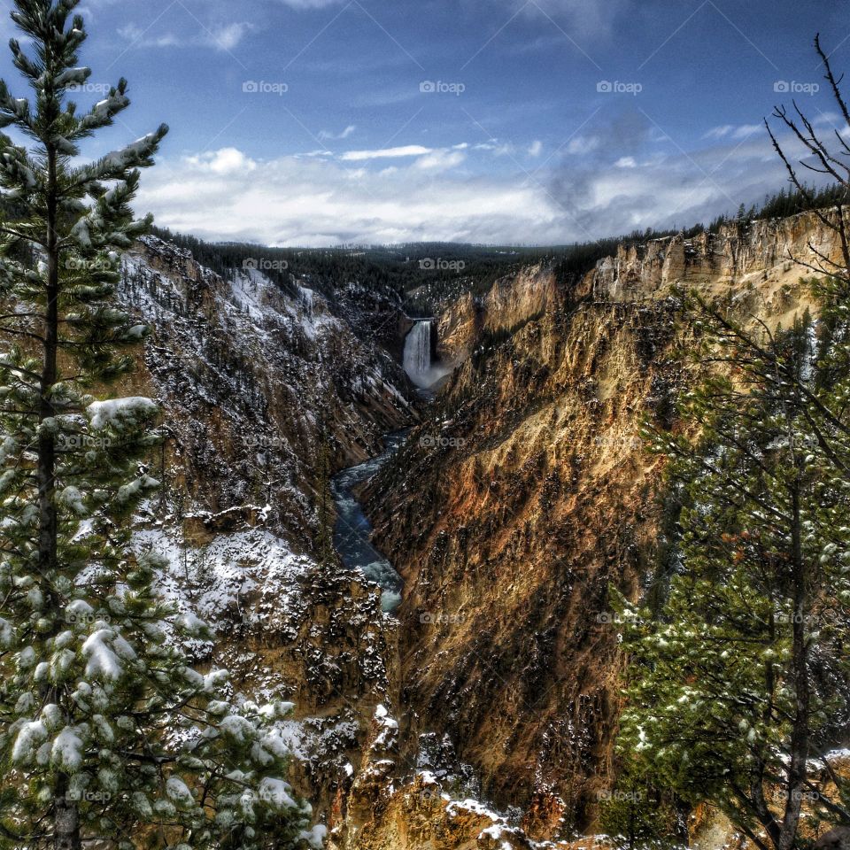 Yellowstone valley with waterfall behind