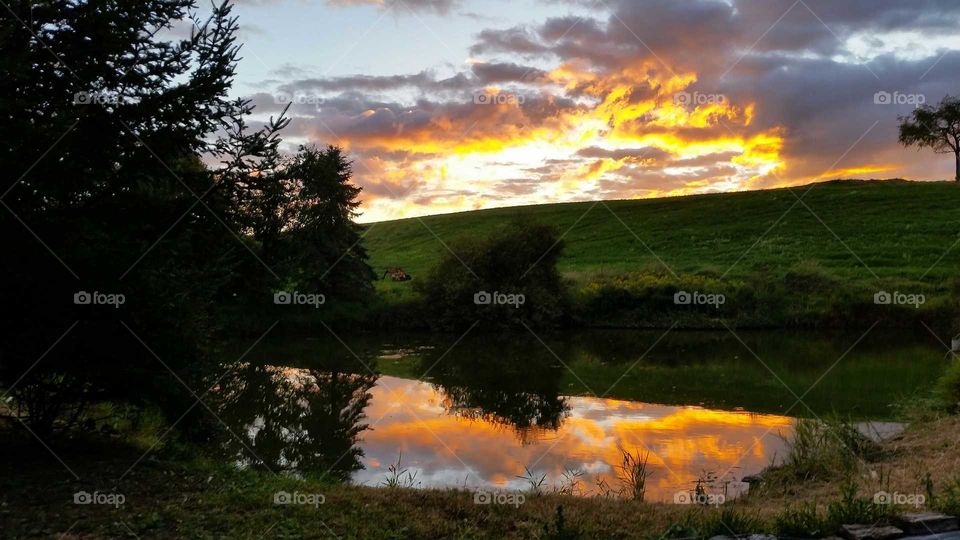 clouds enclosed in gold. just before sunset on the lower 40