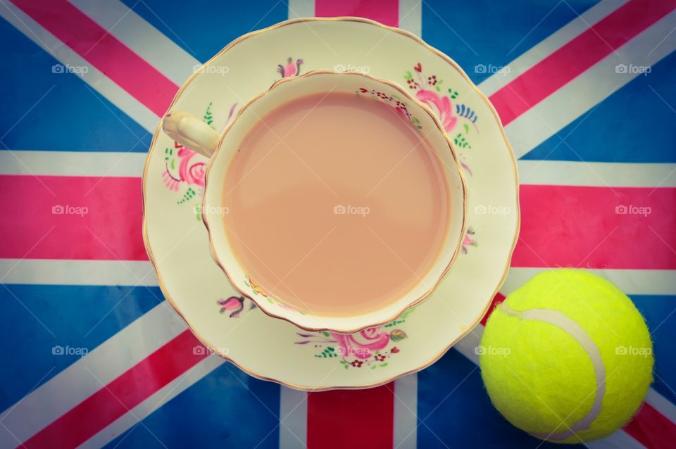 British Tennis. A cup of tea and a tennis ball on a Union Jack flag 