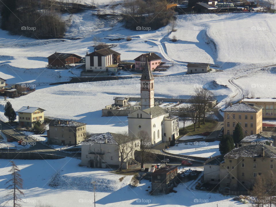 Looking down on a snow covered town