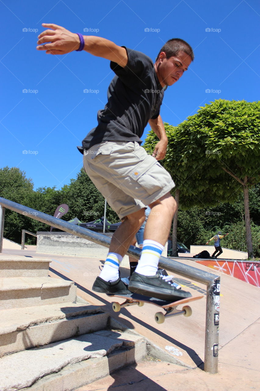 Skater in the skatepark training 
