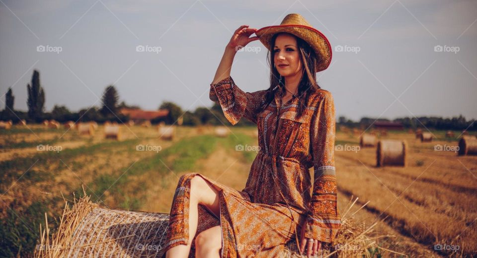 Country girl on meadow