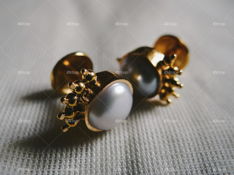 Pearl studded golden earrings