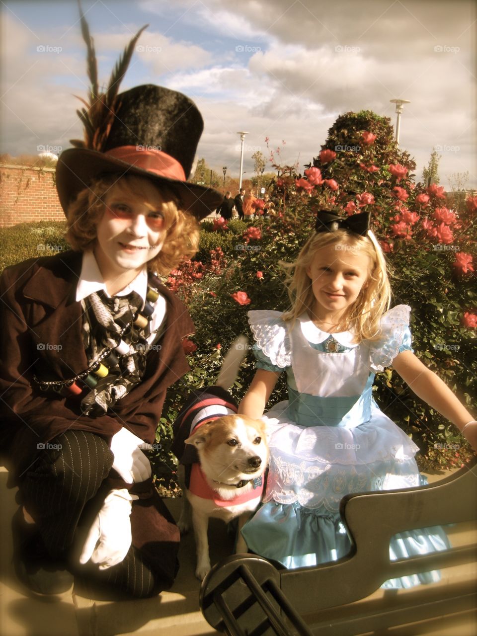 Alice, The Mad Hatter and their dog