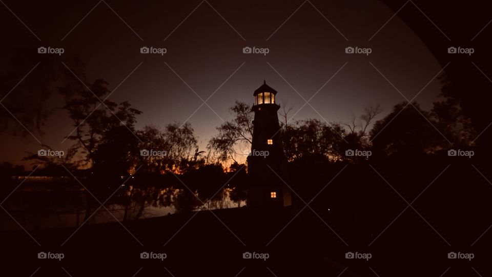 The Evening is passing the Lighthouse has woke up to shine it’s Glory and protect and guide everyone along the North Shore. 