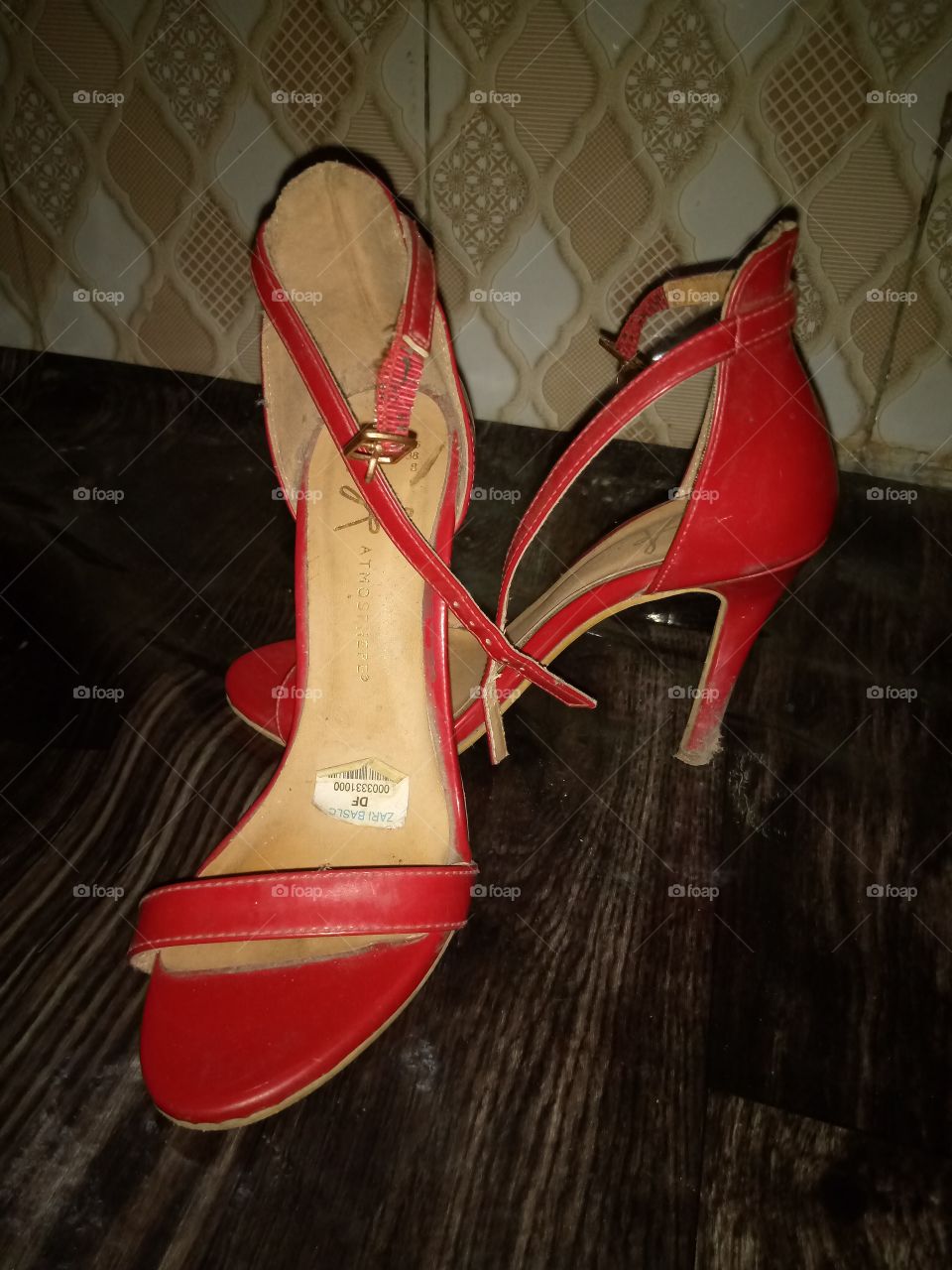 my wedding shoes. A red heeling shoes. wearing heeling shoes makes someone walks with balance and elegance.