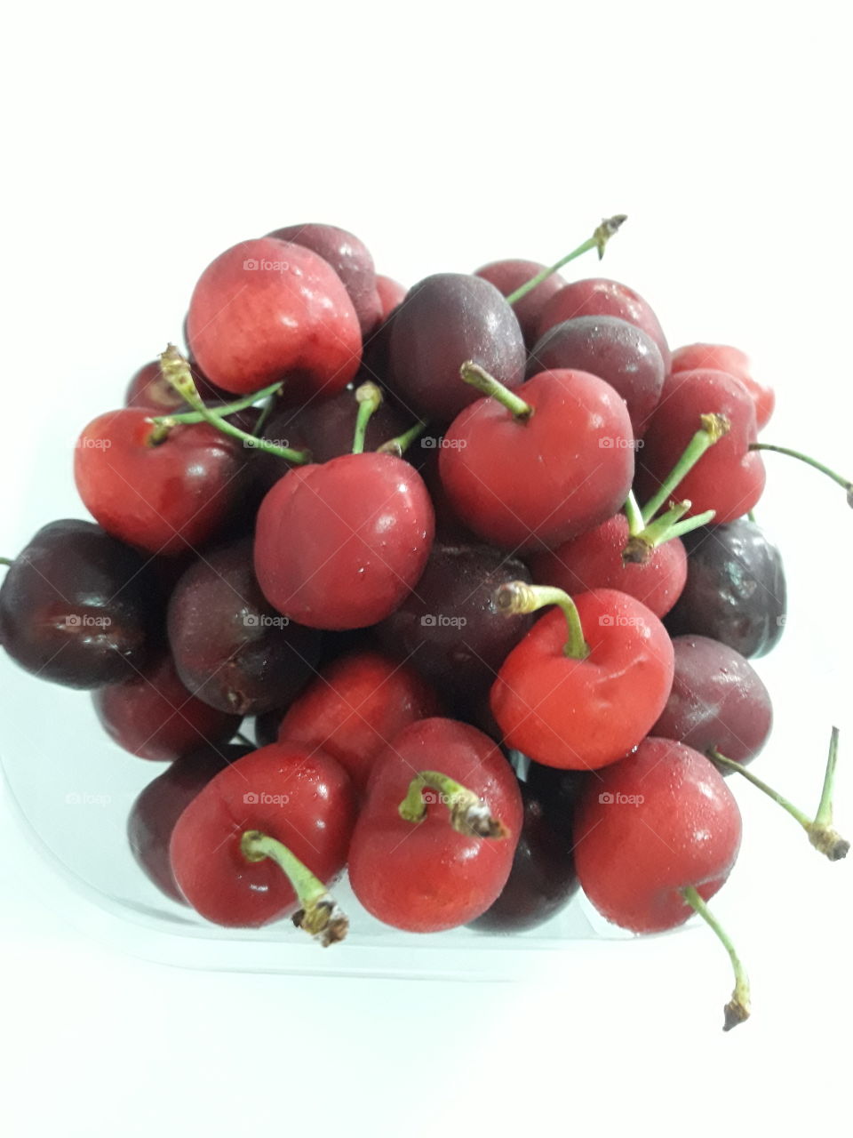 Cherrys are the fruit that has  sweet and sour taste.Their shape are round,not big.Their color of peel are red, dark red, orange and yellow which depend on their species.