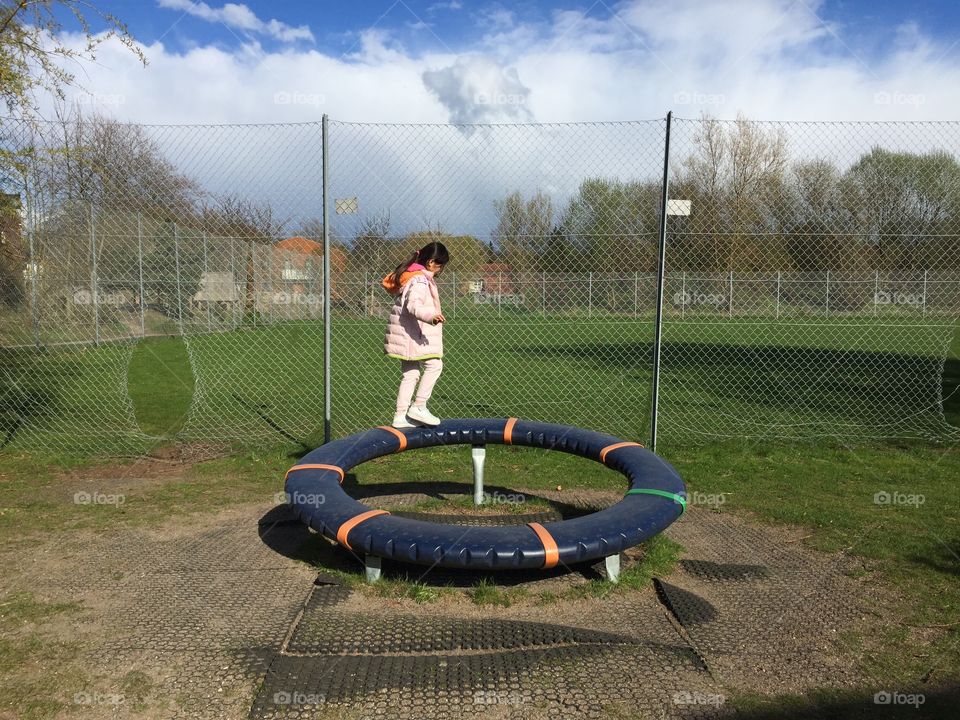 Having fun at the playground. 