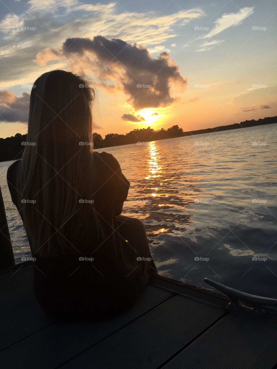 Sitting by the lake on a summer night 