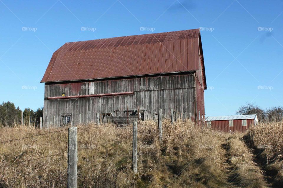 Old barn with fence