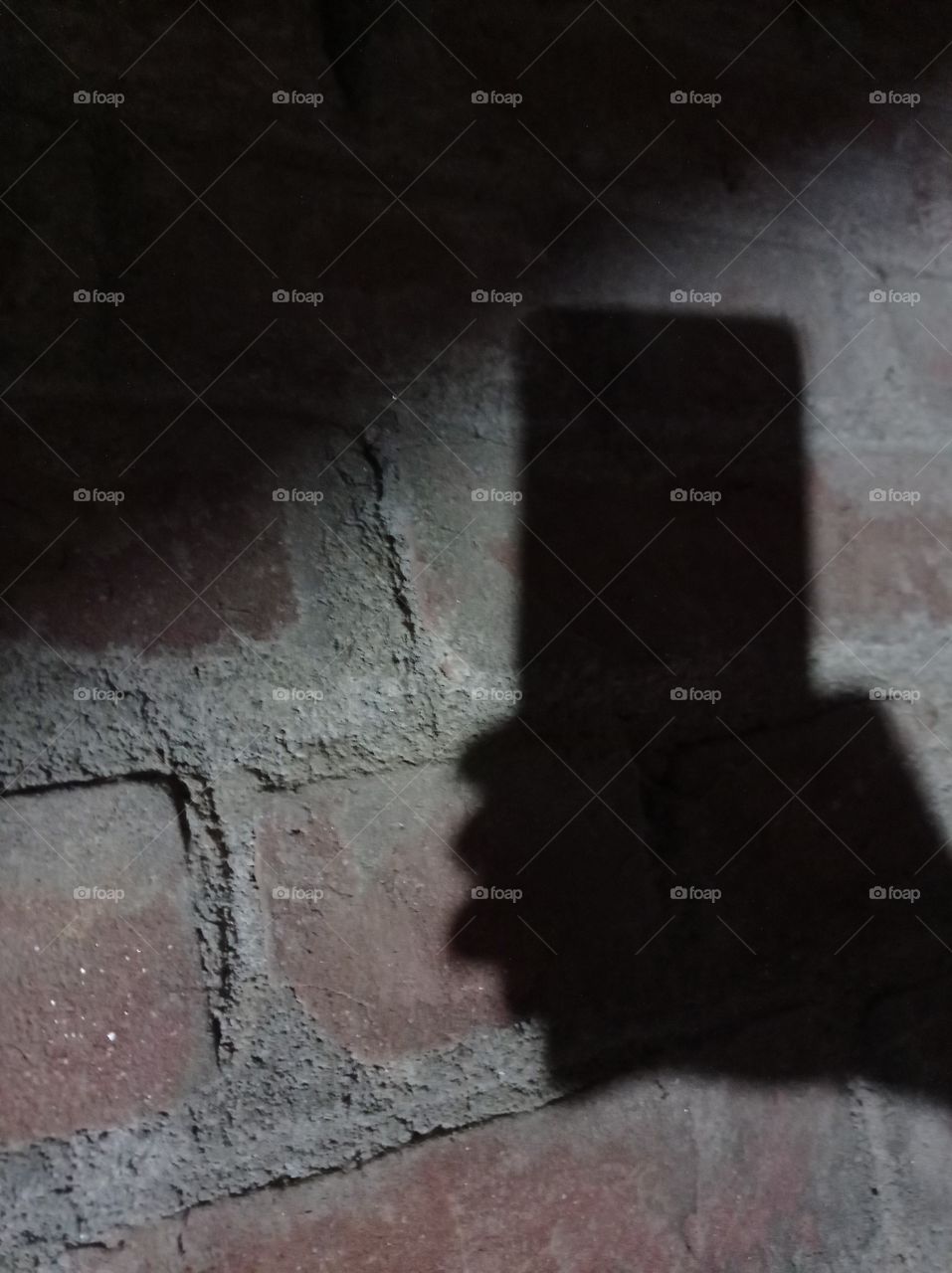 Shadow of mobile holding