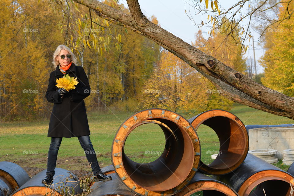 morning walking woman in autumn park