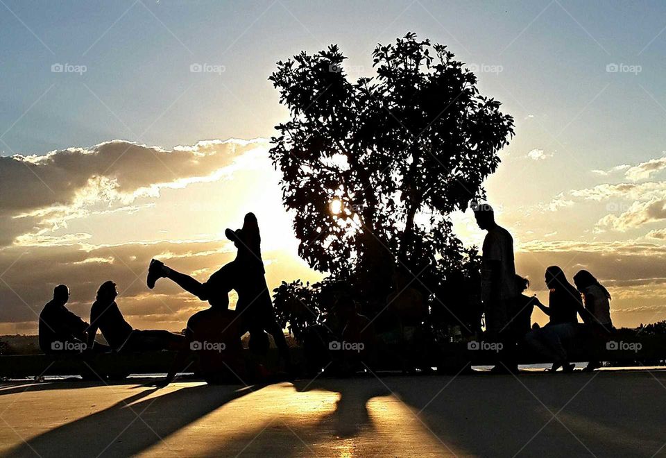 dancing at sunset. capoeira as brasilian dance