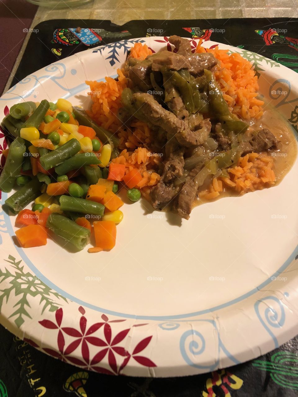 Pepper steak rice and gravy....With a twist of mixed vegetables....
