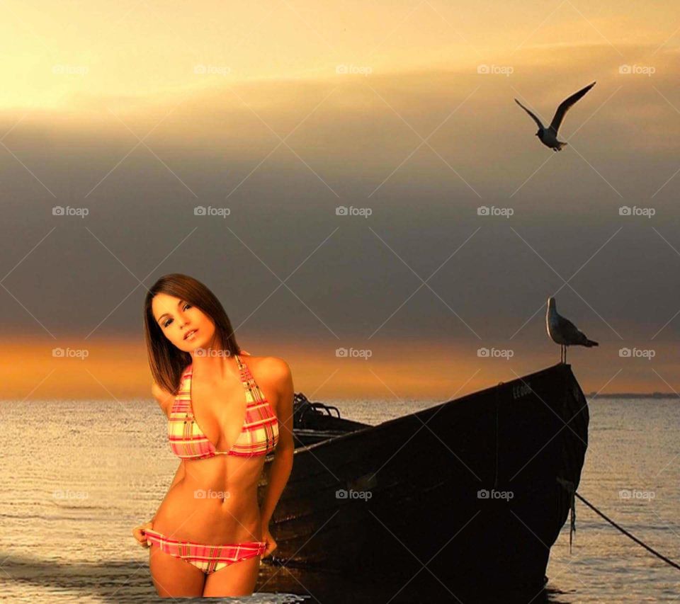 Portrait of a beautiful woman at sea