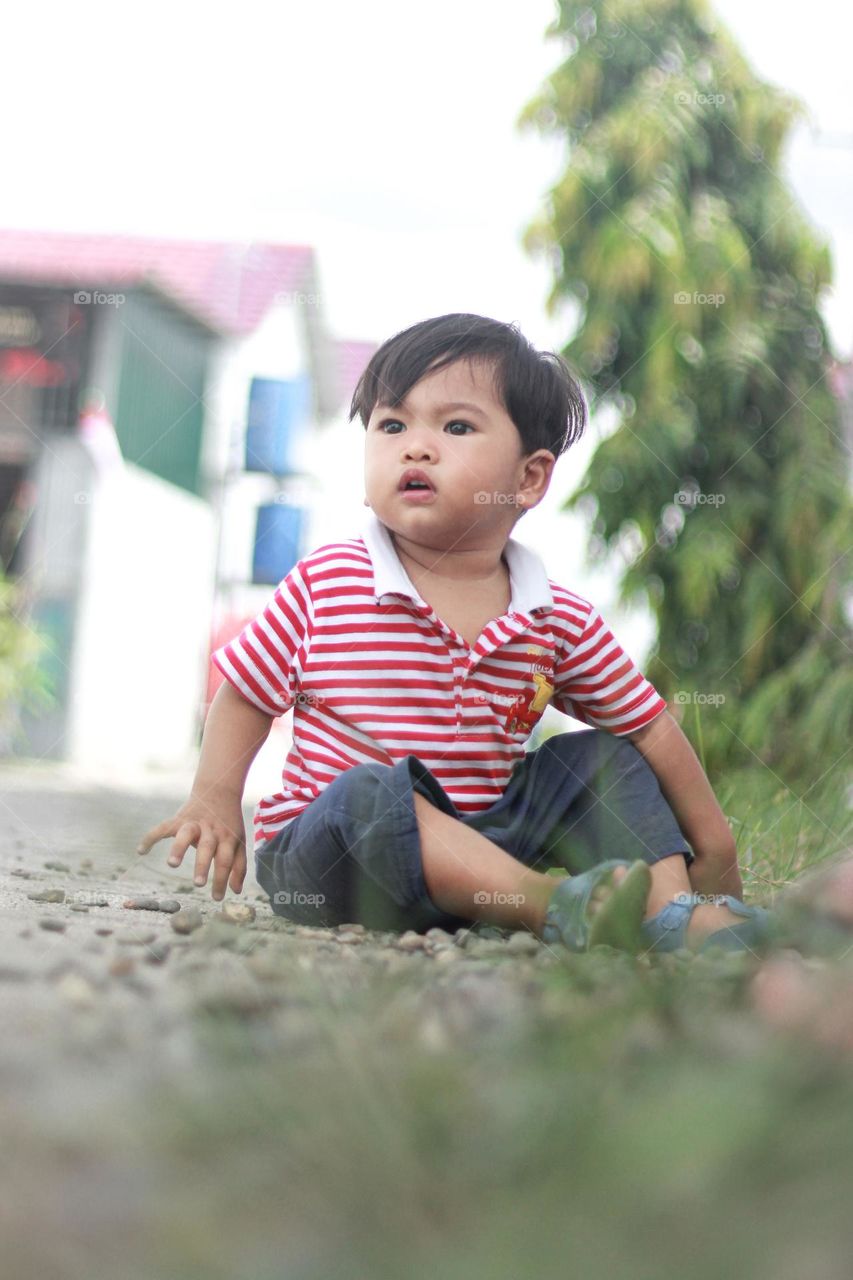 palying in the grass