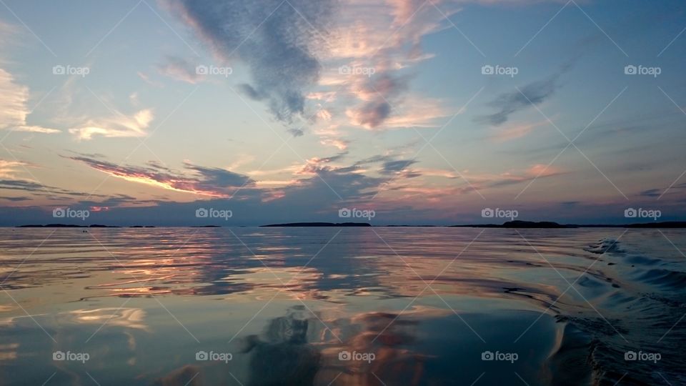 Scenic view of sea at sunset