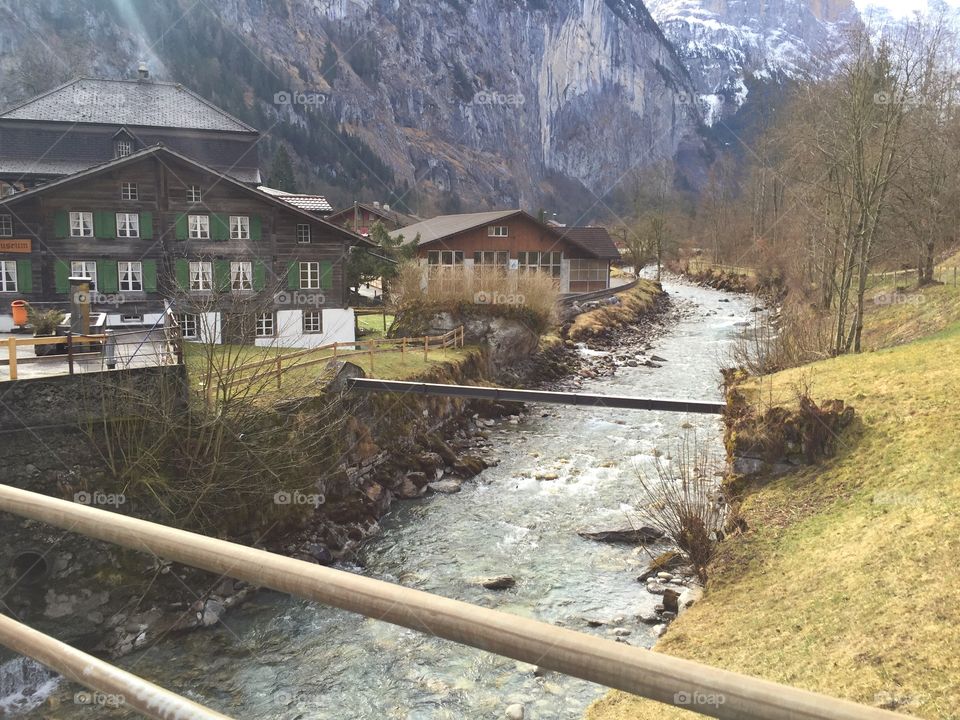 Stream flowing between the mountains 