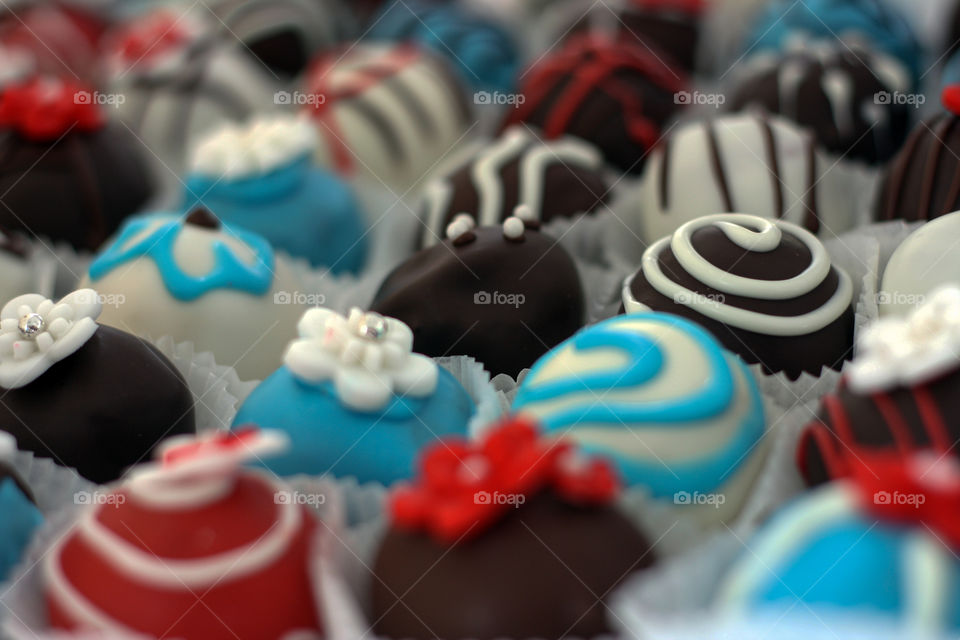 Cake pops decorated in blue and red 