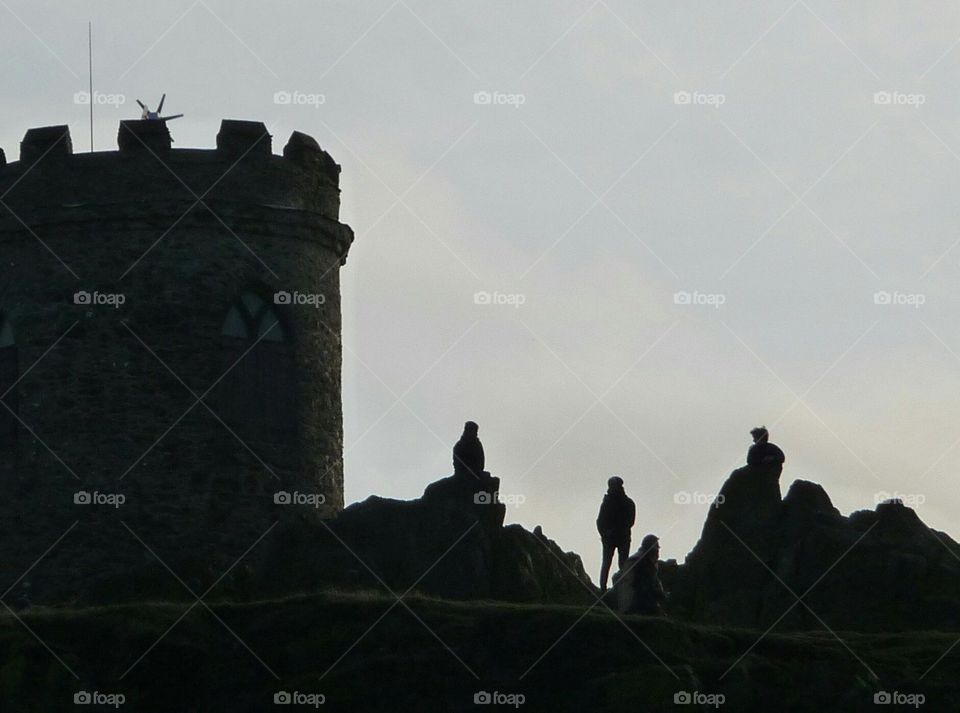 castle and people at dusk