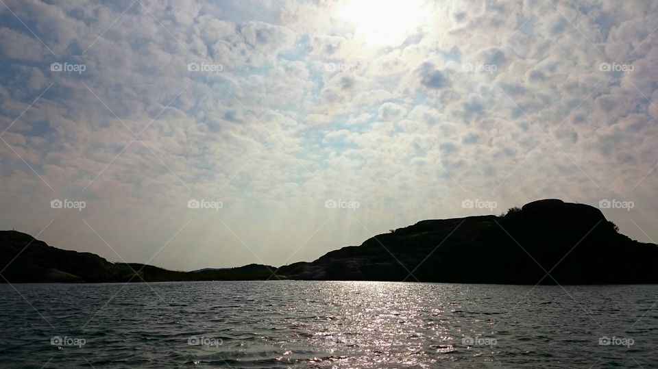 sunrays through the clouds